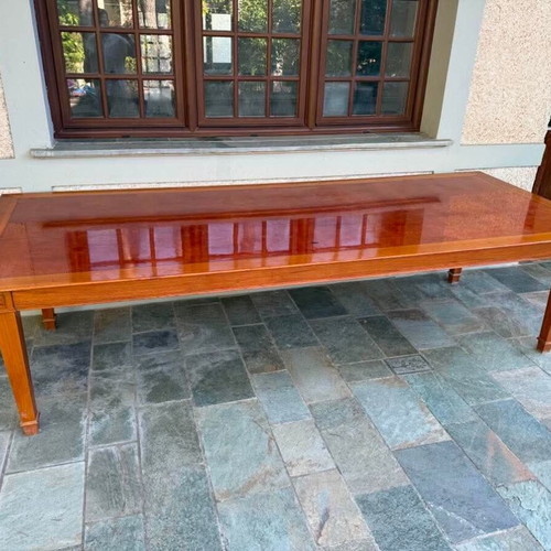 Solid wood dining table with decorative border and square legs