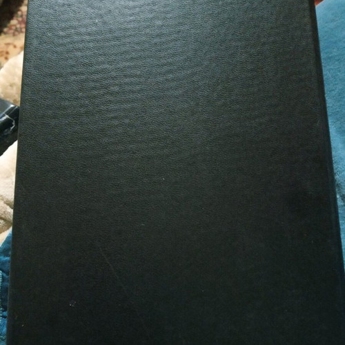 Leather-bound book For Whom the Bell Tolls used