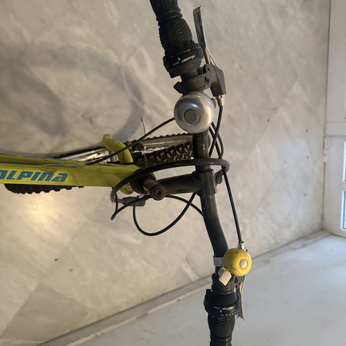 Alpina Yellow Mountain Bike used with 27 inch wheels and V-Brakes