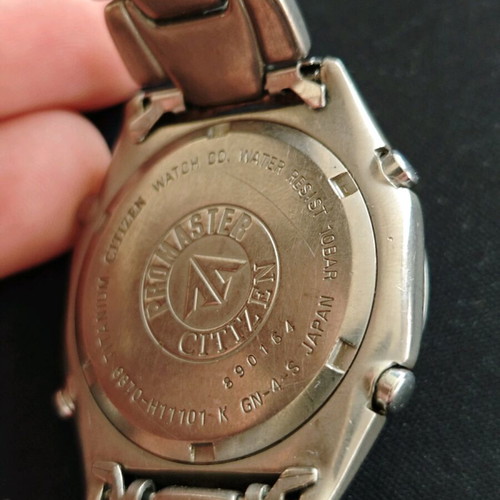 Citizen titanium Promaster watch men used, non operational, wr 100, model 6870-H11101