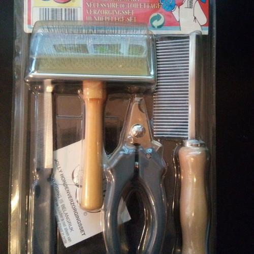Dog and cat grooming kit new with comb, nail clipper, brush and file