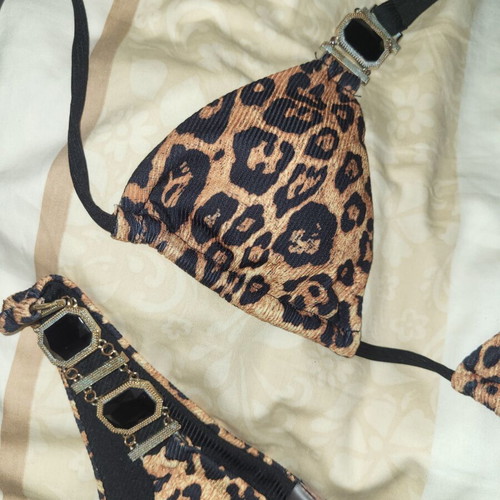 Swimsuit with leopard print and black stones used, size S