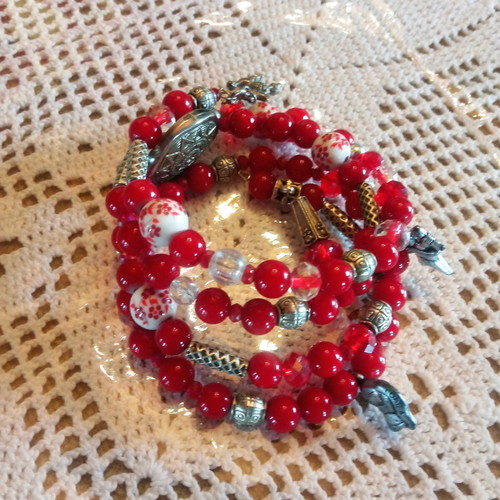 Handmade bracelet with red beads and multiple strands, new