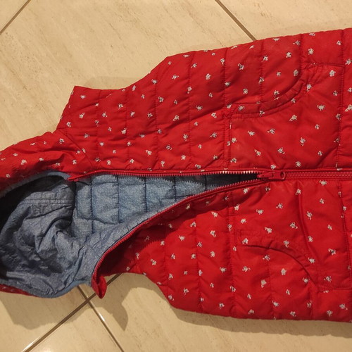 Sleeveless jacket 6 years like new, double-faced, blue and red