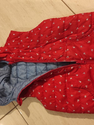 Sleeveless jacket 6 years like new, double-faced, blue and red