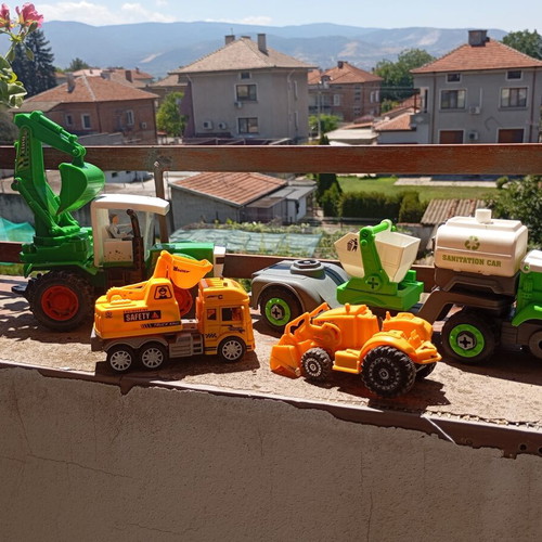 Children's construction and specialized toy trucks set of 4 used