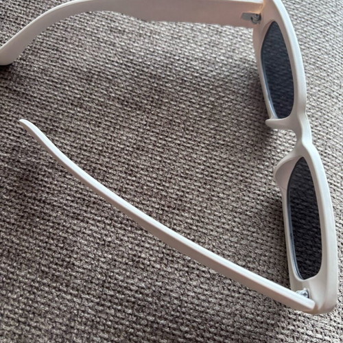 Sunglasses used with beige frame
