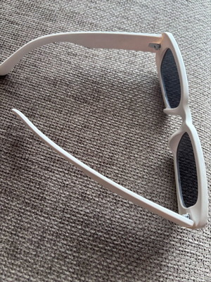 Sunglasses used with beige frame