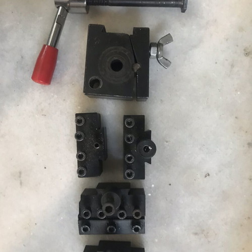 Automatic tool holder for small lathe used with 4 clamps