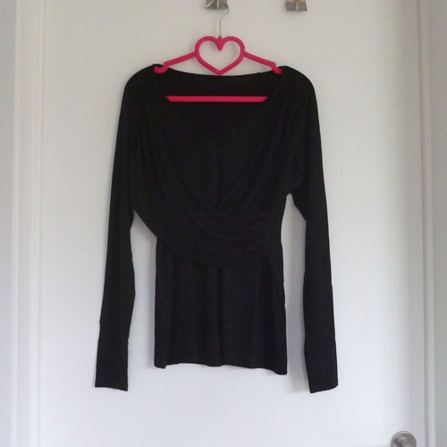 Black stretch long sleeve shirt with front wrap, size 36