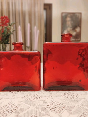 Set of two used decorative red glass vases made in Spain