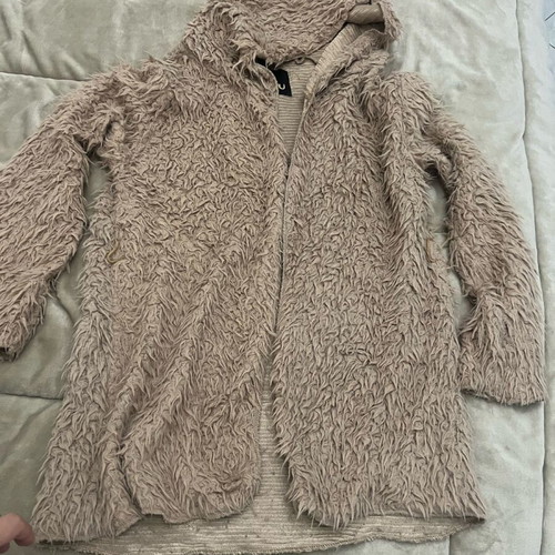Beige fur jacket used, fits small and medium