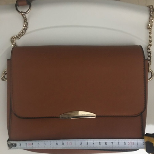 Small tan crossbody bag lightly used