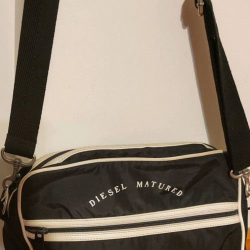 Diesel shoulder bag used, black with adjustable strap and compartments