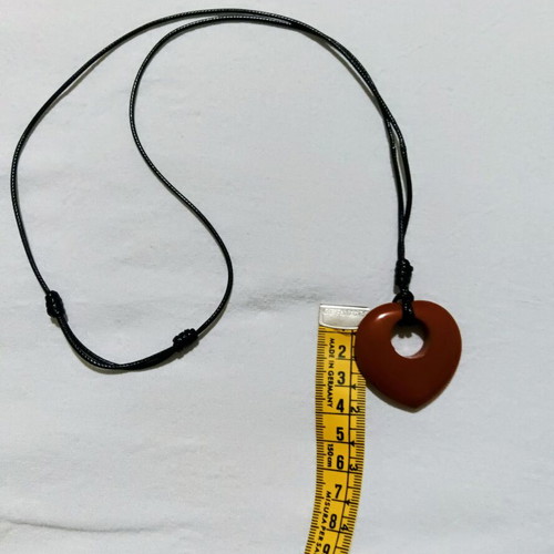 Semiprecious stone pendant with red jasper heart donut shape