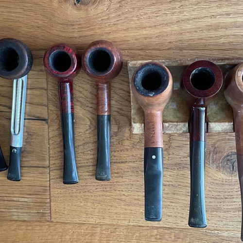 Smoking accessories like new, pipes, stands, pouches and cleaning tools