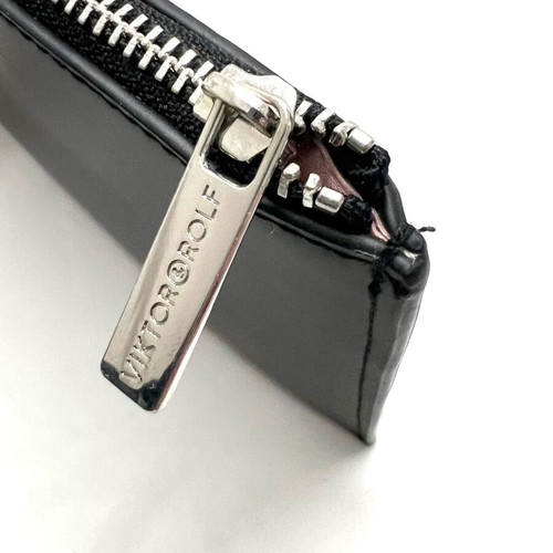 Victor & Rolf black zip clutch bag used