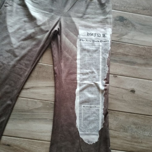 Elastic bell-bottom pants with front print, like new, size XL