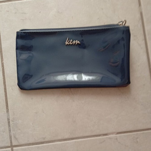Kem bag wallet unused, shiny gray