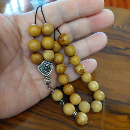 Komboloi from olive wood new, 21+3 beads with metal decorations