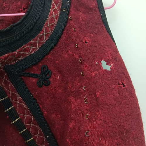 Collectible traditional woolen burgundy vest used