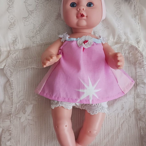 Baby Suzi doll like new with handmade clothes