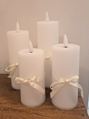 Led candle set of 4 with battery and remote, like new