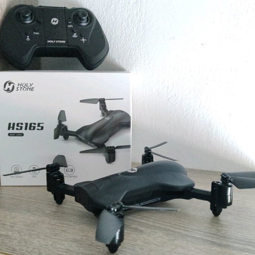 Holy Stone drone used with remote control and spare propellers