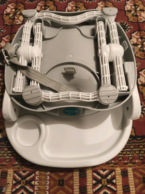 Honeybaby folding portable booster seat used for feeding