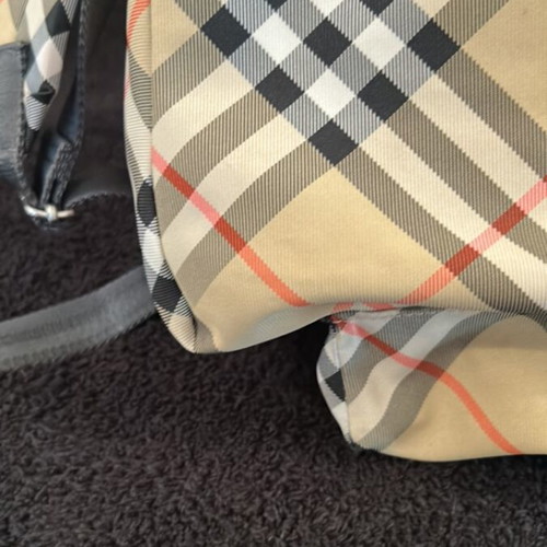 Burberry backpack like new with 2 zippered compartments and adjustable straps