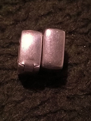 Silver earrings used with geometric shape and hinged clasp