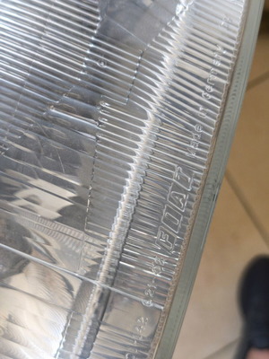 Fiat Punto MK1 left front headlight, genuine, with two bulbs, no cap