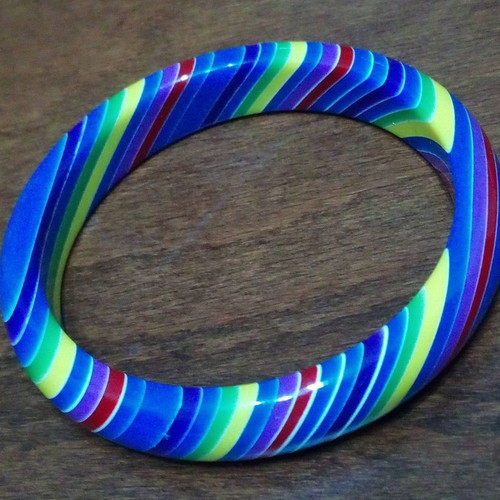 Set of 7 used neon rainbow resin bracelets 70s style