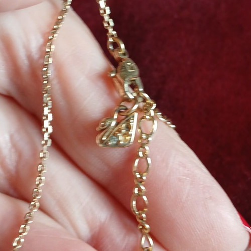 Swarovski necklace and bracelet set like new, gold color