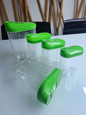 Food storage containers used, set of 5 with green lids