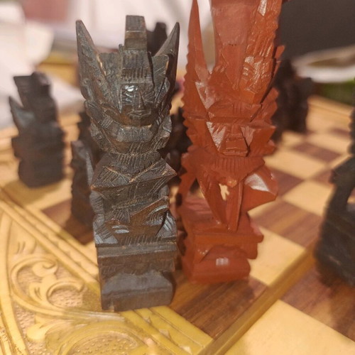 Carved backgammon/chess used with wooden Aztec-style pieces