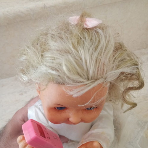 Vintage mechanical doll used, non-functional