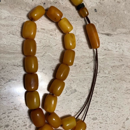 Worry beads used from royal amber with silver logo