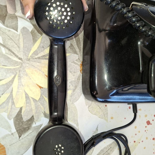 Collectible old-style telephone used, black, functional