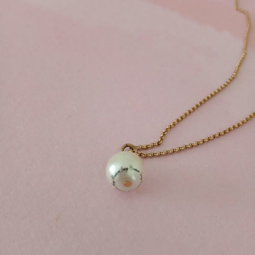 Juicy Couture necklace used with pearl and brand name