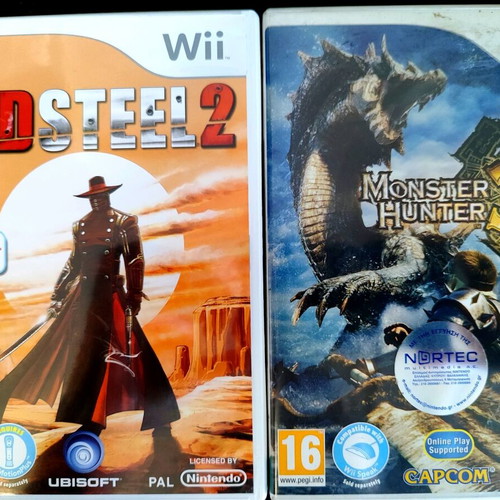 Nintendo Wii game pack used, Redsteel 2 and Monster Hunter 3