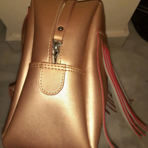 FRNC Backpack gold/bronze with fringes and matching pouch like new