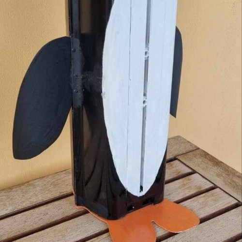 Decorative penguin like new made from recycled CCTV camera