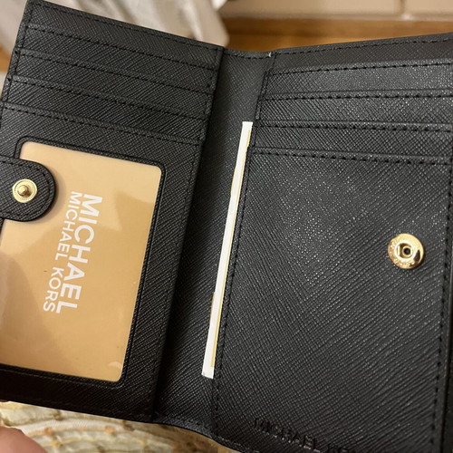 Michael Kors black wallet new with card slots and zipper coin pocket