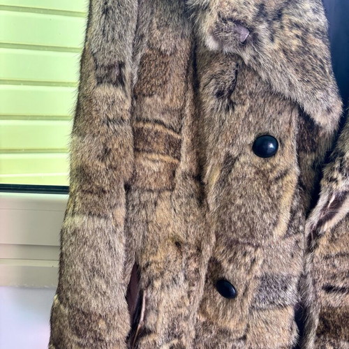 Synthetic fur size large like new, beige