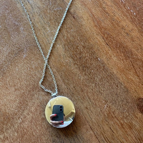 Steel necklace chain with mother-of-pearl and zircon pendant