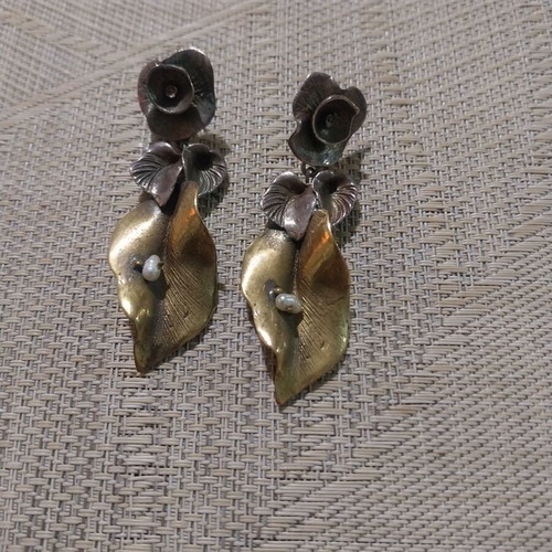 Handmade earrings used, copper and tin alloys with pearl
