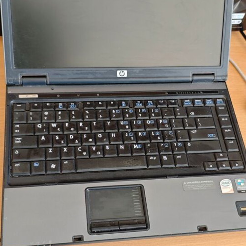 HP Compaq 6510b laptop used, Windows 7, includes charger