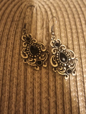 Hanging earrings like new, metal with black details