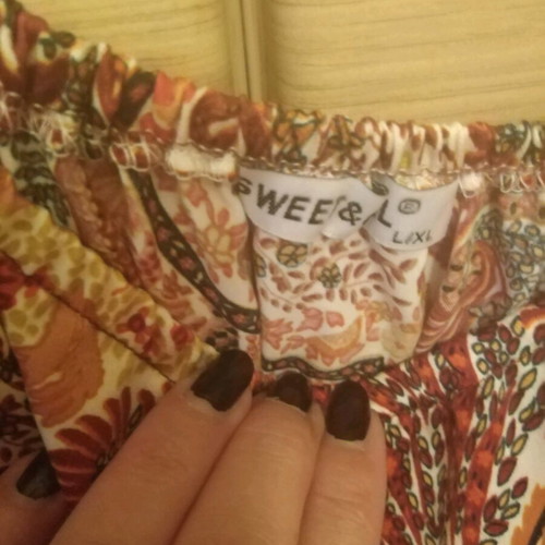 Dress like new, size L/XL, with unique sleeve